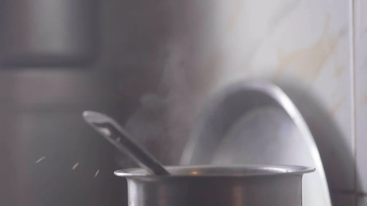 indian yellow dal boiling on stove