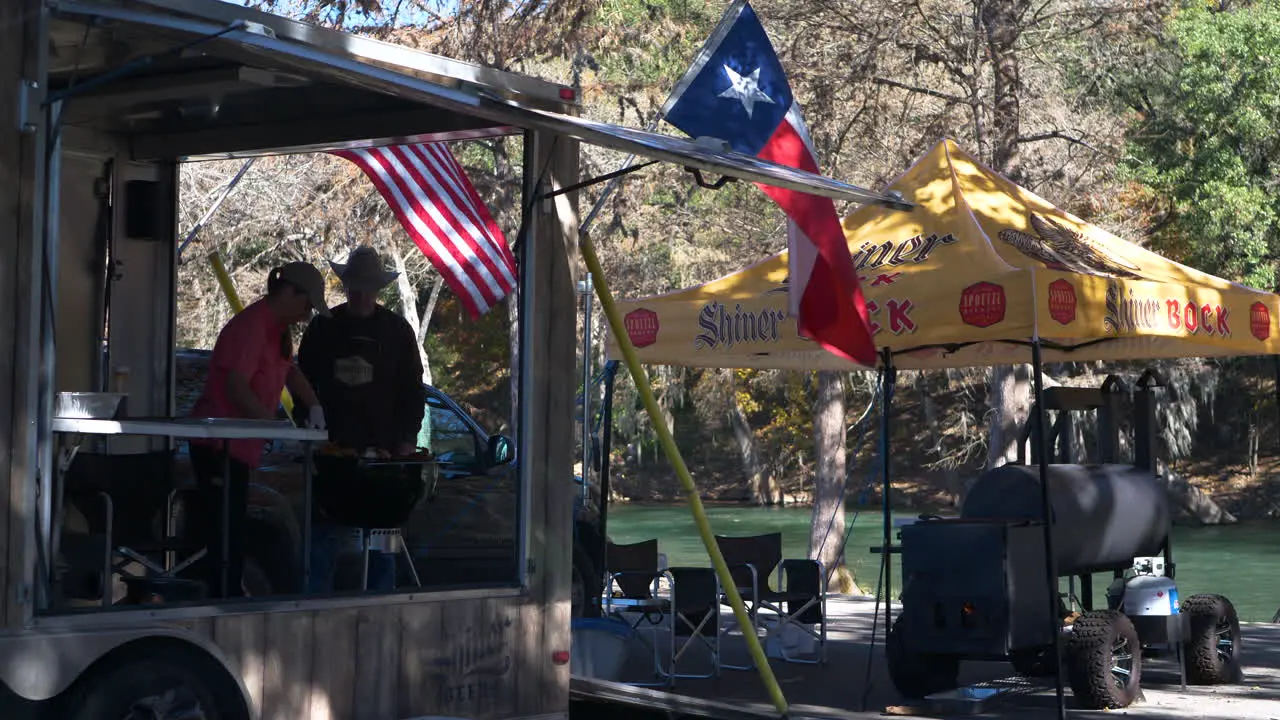 A Team Tent Food Truck and BBQ Pits at a BBQ Cook Off Competition