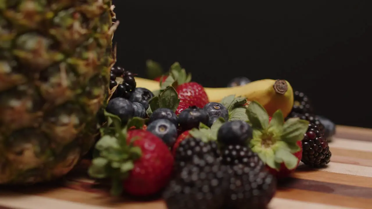 Fruits spinning on a cutting board-1