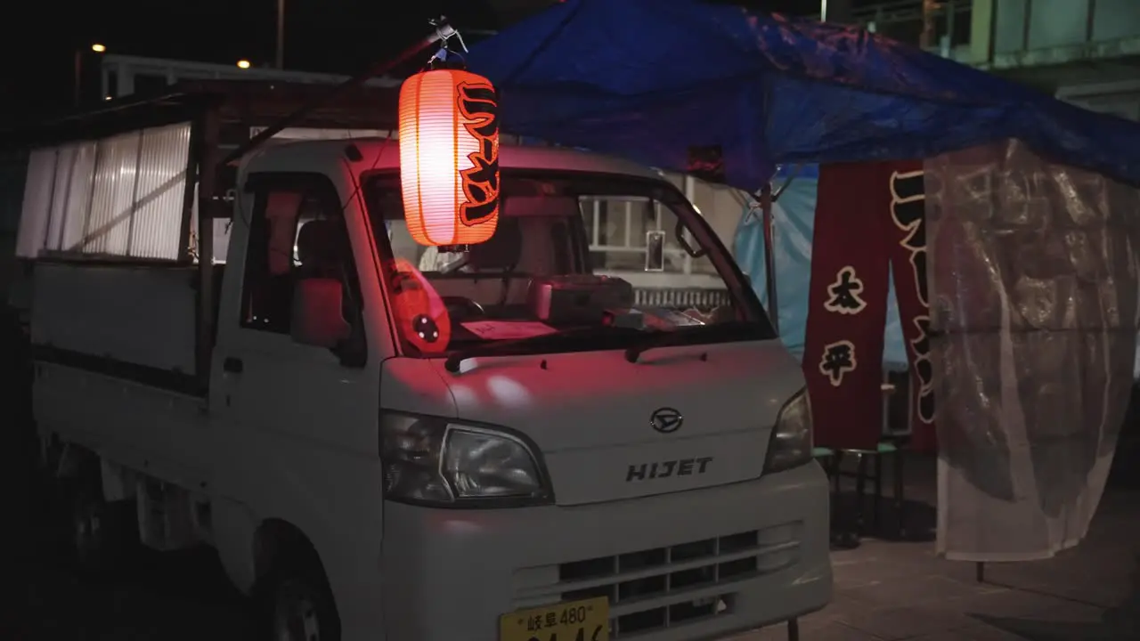 Traditional ramen food truck at night wind blowing curtains in the night