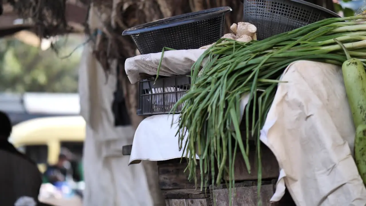 Stack Of Greens Beside Plastic Bowls At Saddar Bazaar Market