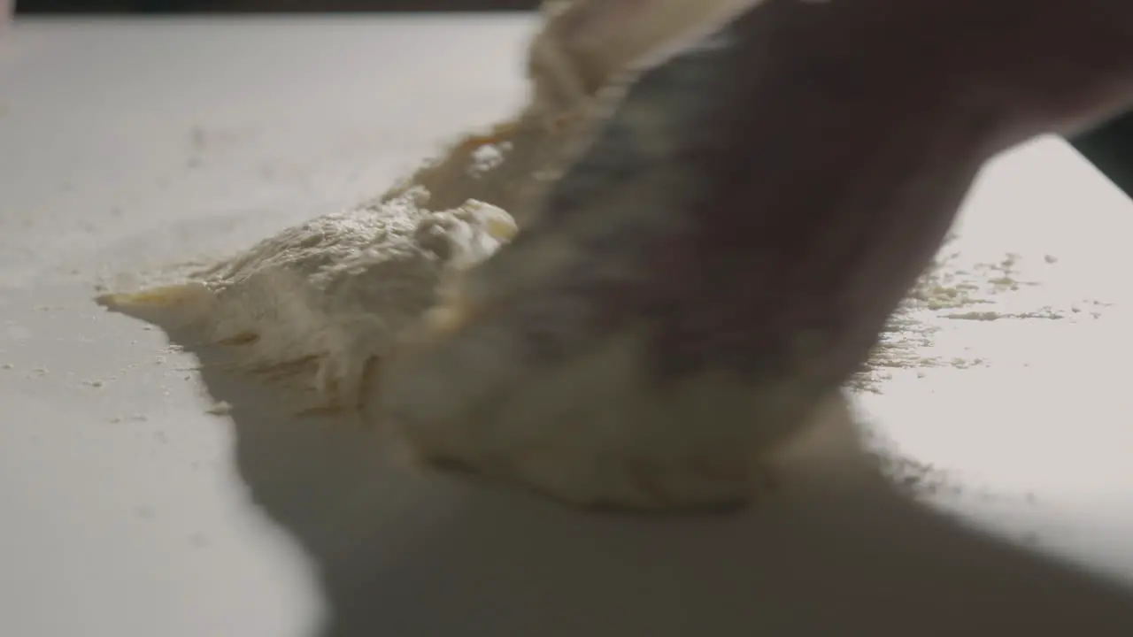 Kneading Dough On Floured Table for home made Pizza Dough