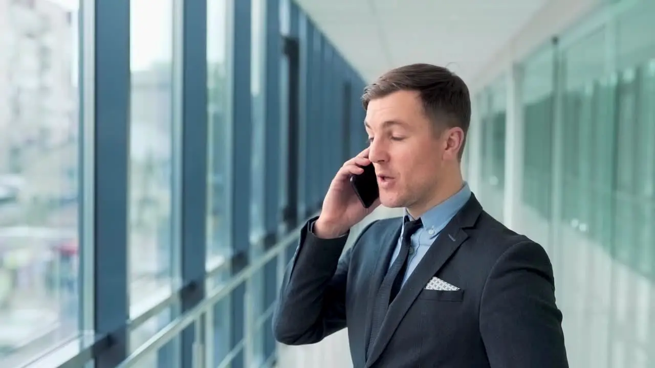 pretty businessman having fun talking on the phone