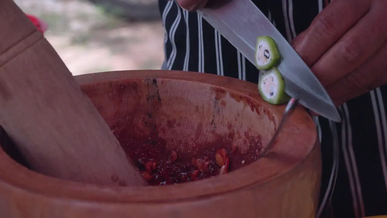 Chopping Ingredients into a Pestle and Mortar