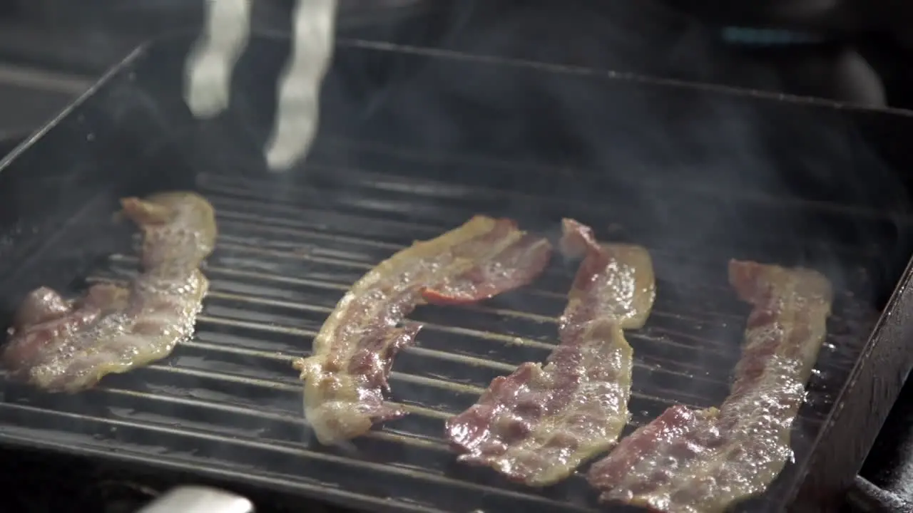 Slices Of Bacon Fried On Grill