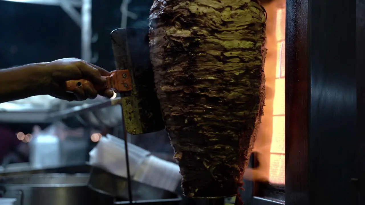 Close up of meat being cooked with fire