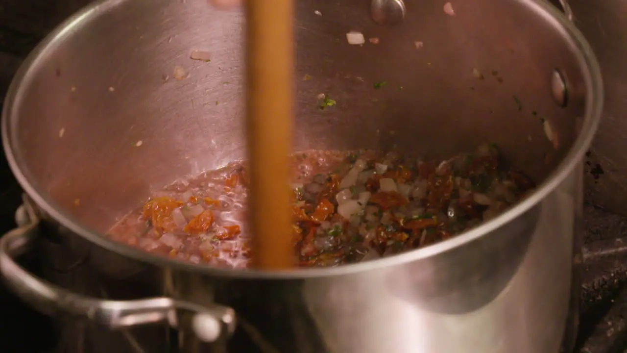 Stirring a delicious looking stew in slow motion