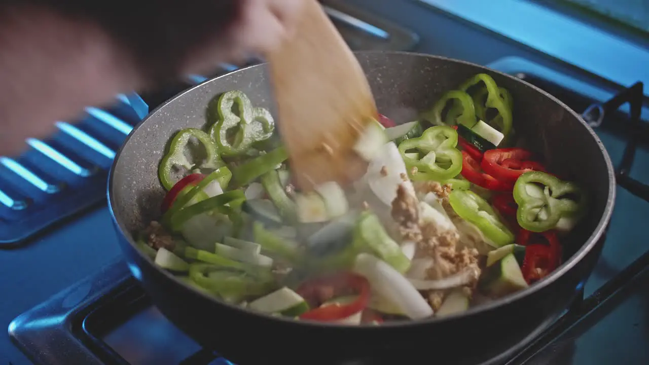 Vegetables and meat in a wok homemade cooking of mexican food