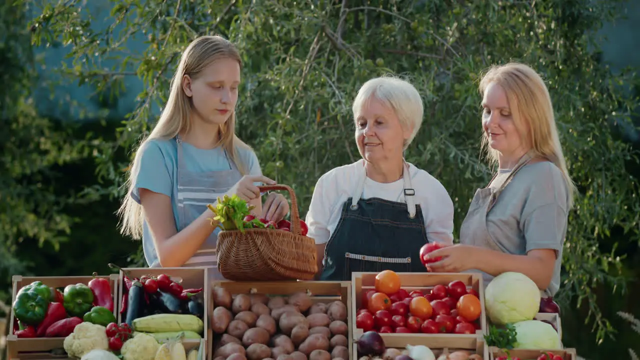 A family of farmers at the counter of an agricultural fair Local vegetables on the counter