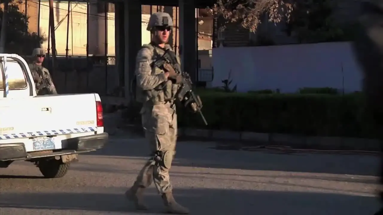 American Soldiers Go On Foot Patrol On The Streets Of Baghdad During The Iraq War 2