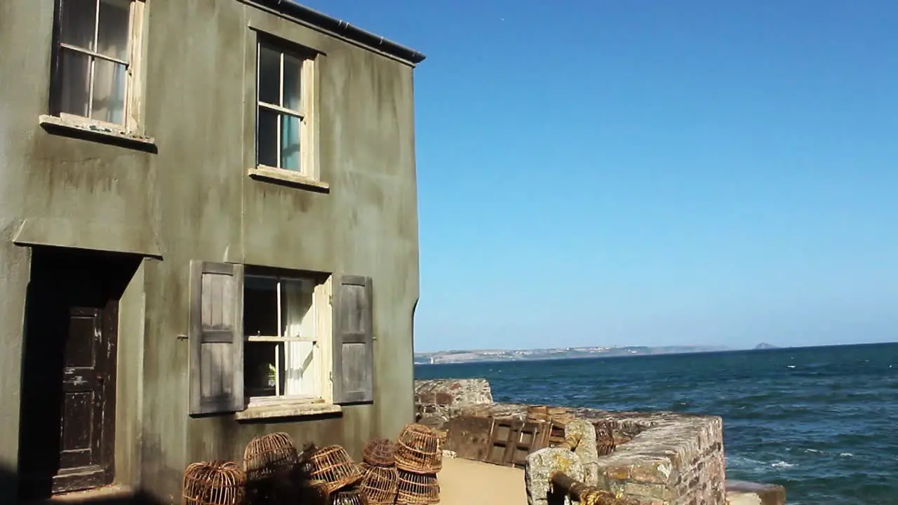 Old House in Fishing Village With Sea