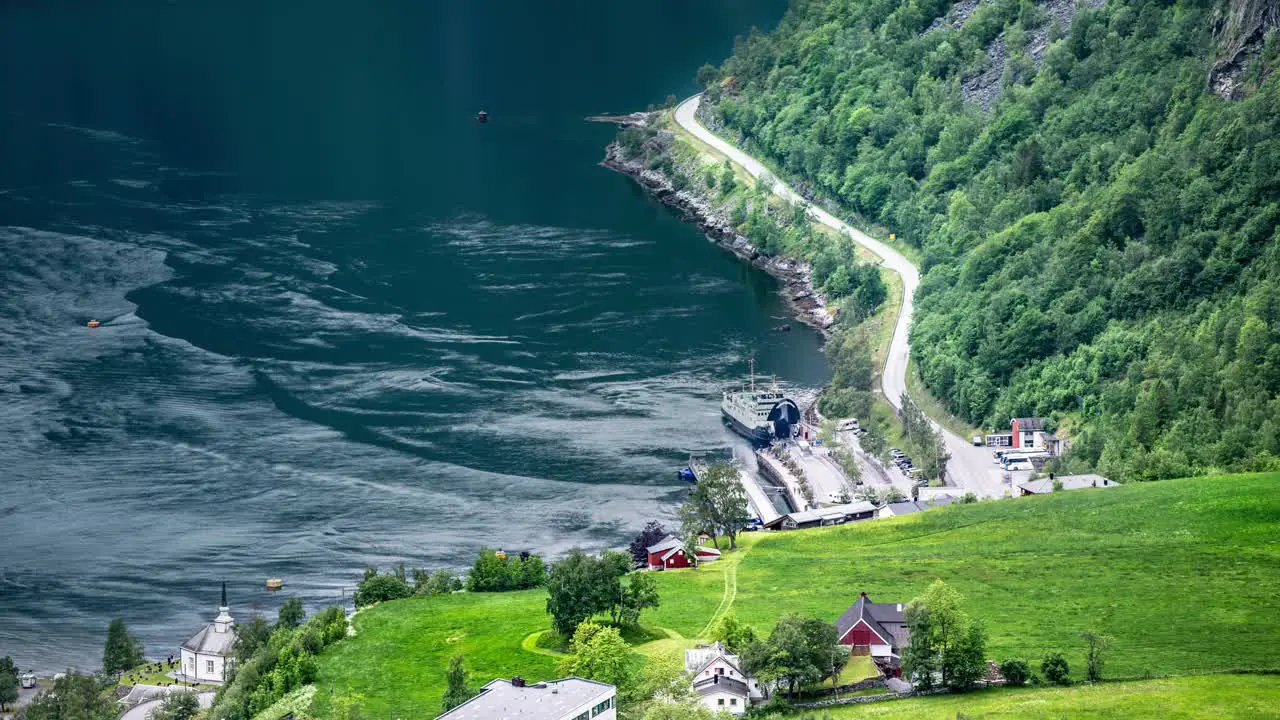 A timelapse of the ferry loading and offloading in Geiranger fjord on a beautiful summer day