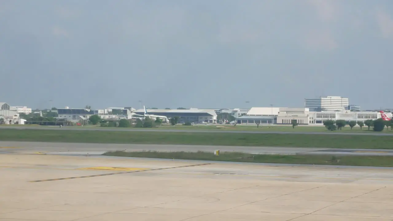 Landscape view in the Donmuang international airport in Bangkok Thailand with airplane take off from the airport