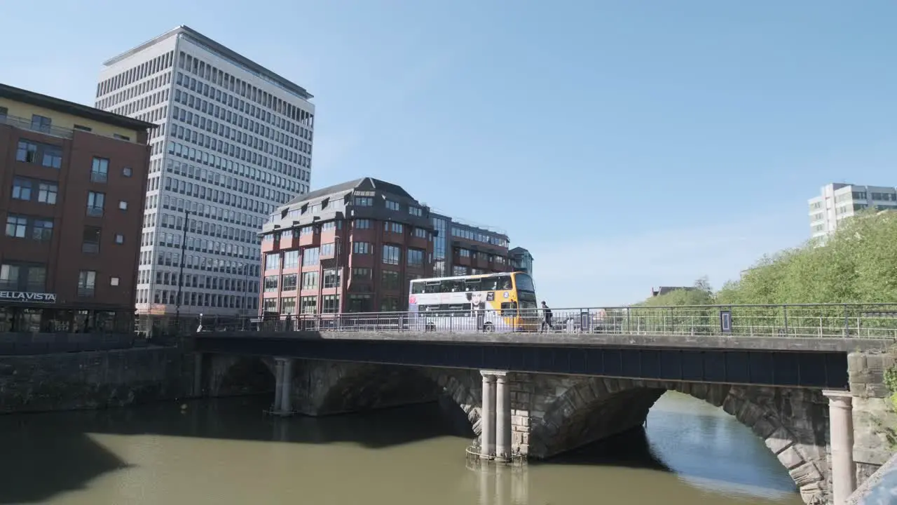 Double decker Bristol Bus passing over bristol bridge mid day