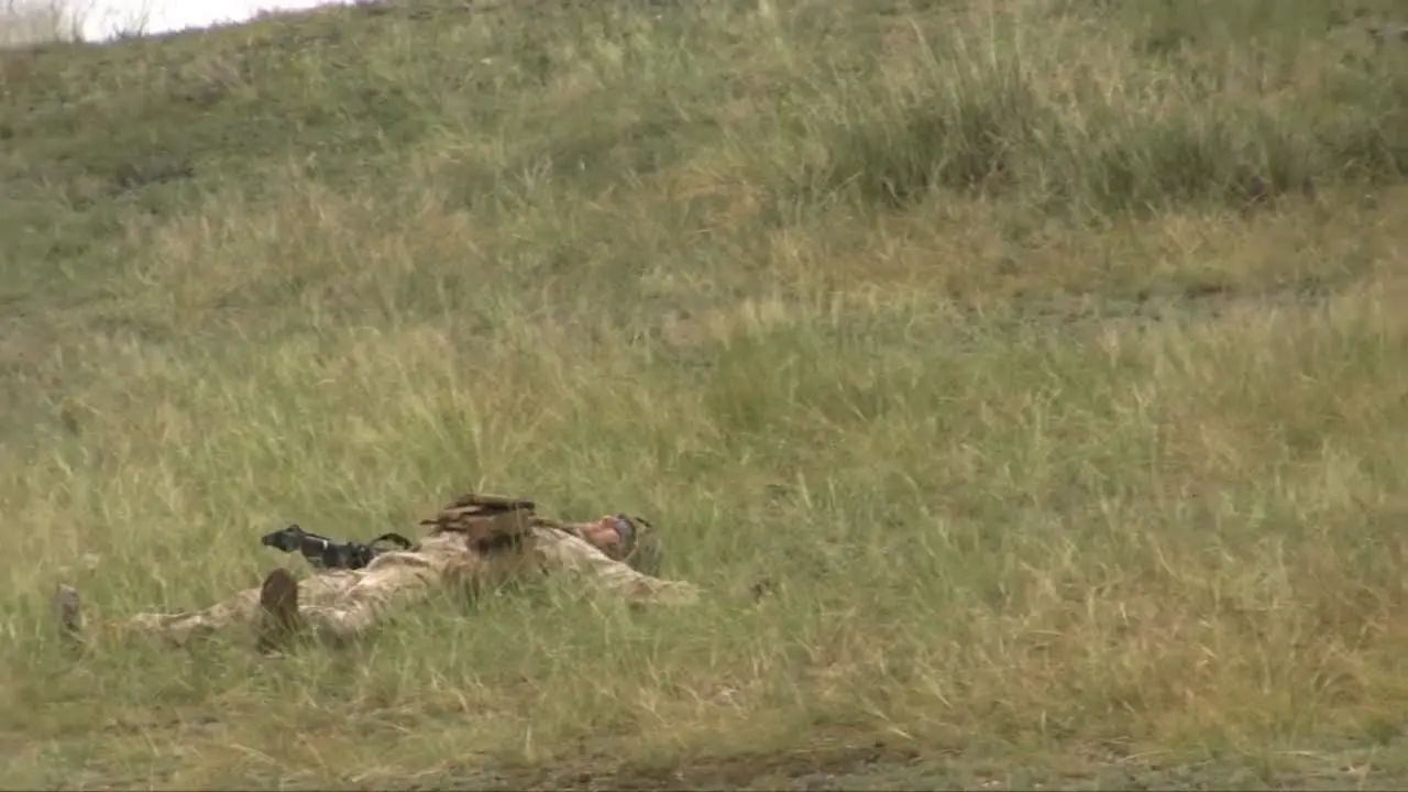 Mongolian Chinese And Us Army Forces Engage In A Mock Battle On A Hillside