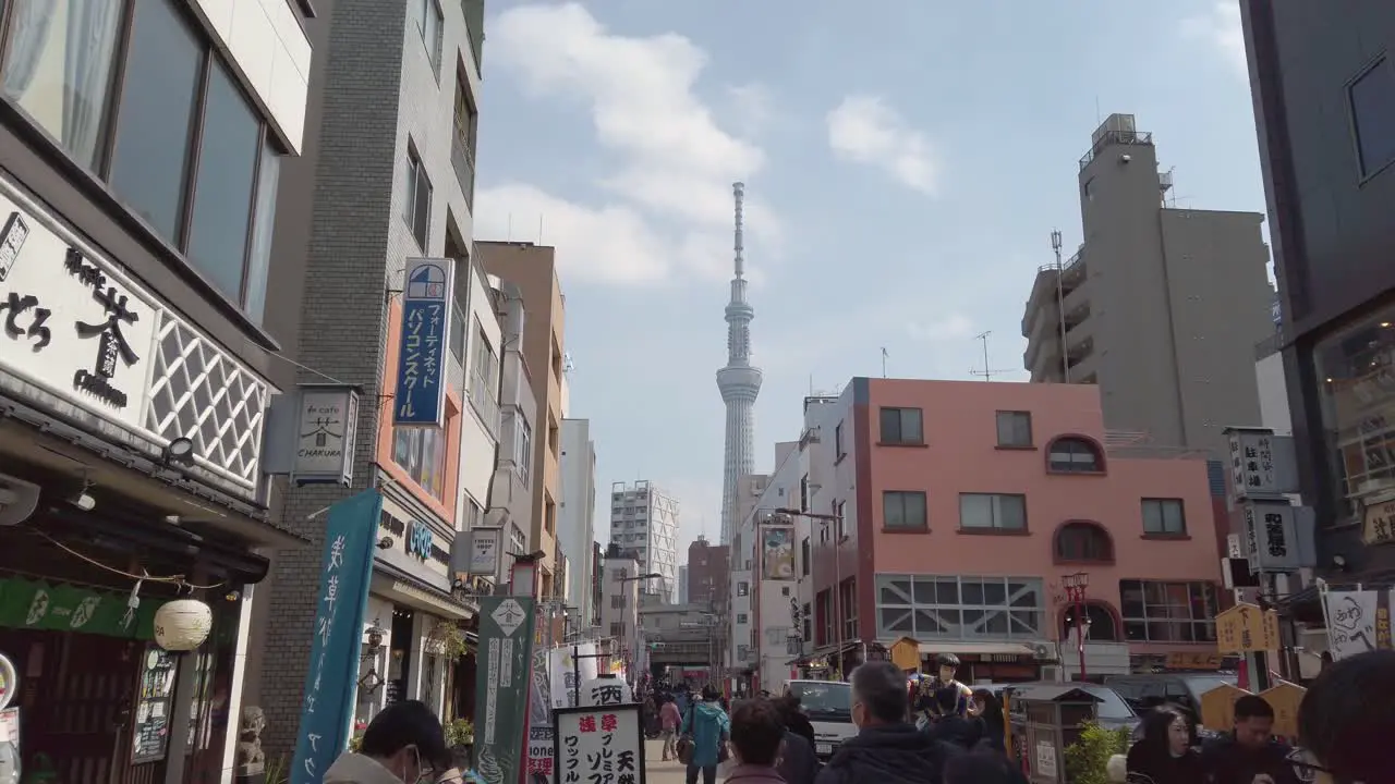 Tokyo city streets in Slow motion Japanese people walking past shops