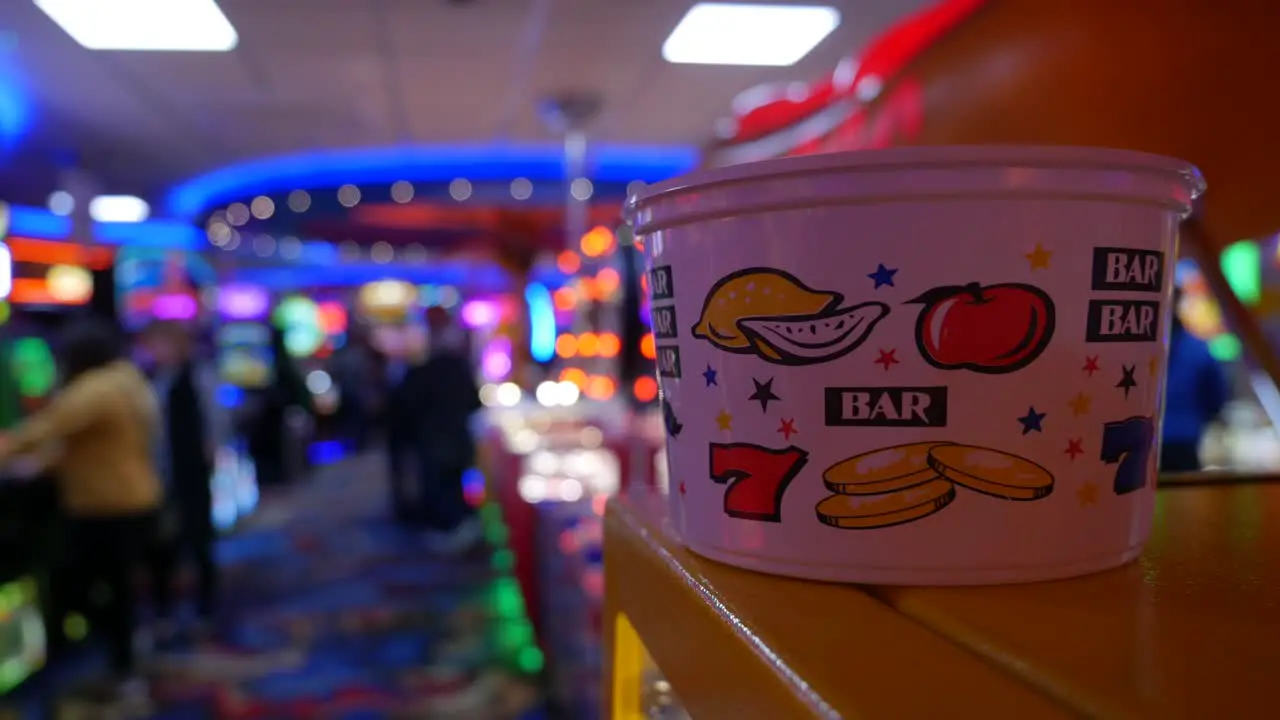 Unrecognizable people playing on slot machines in a Las Vegas casino