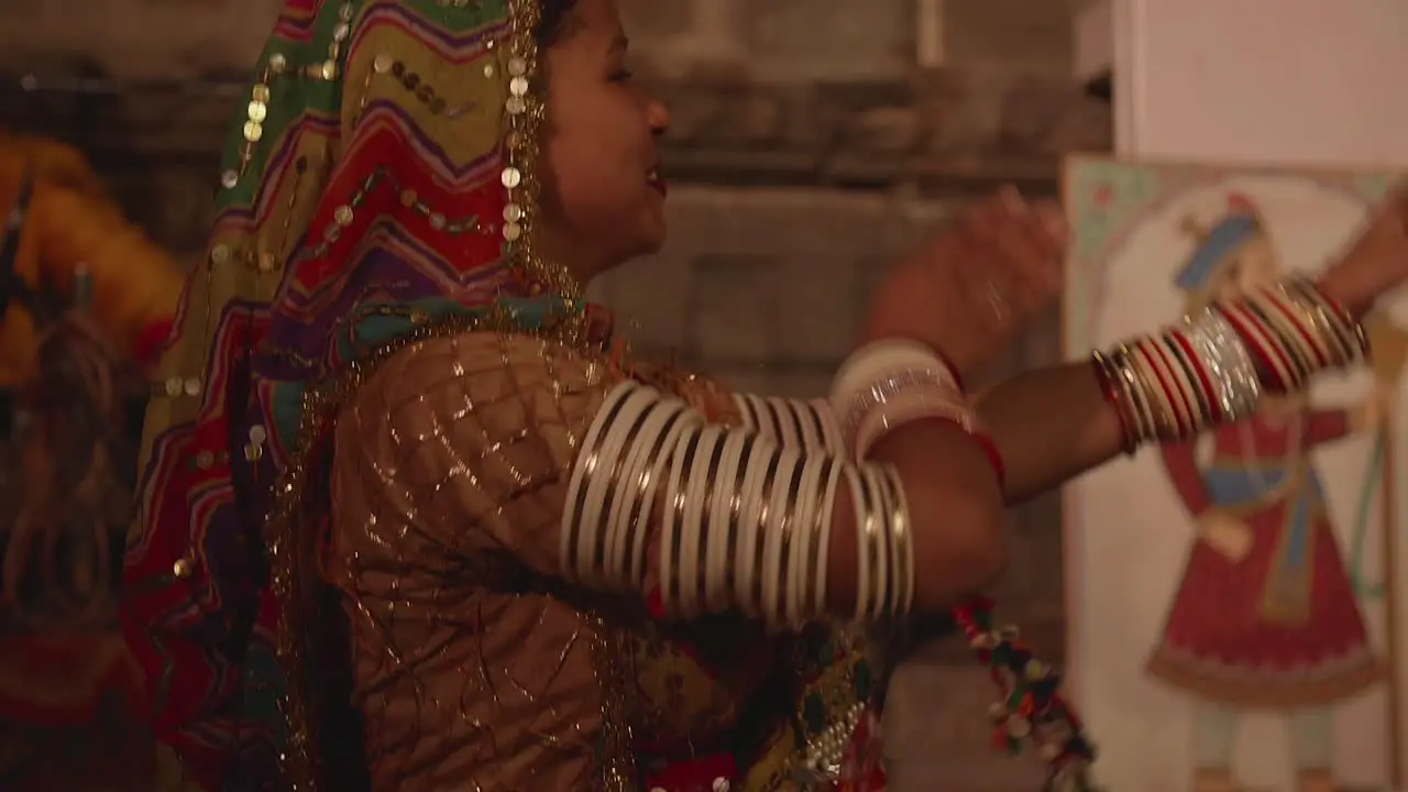 Gypsy woman wearing traditional dress performing dance