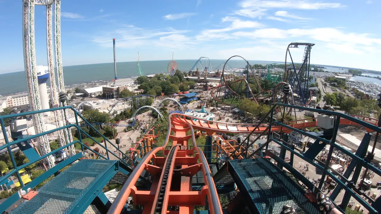 POV of fast rollercoaster in amusement park