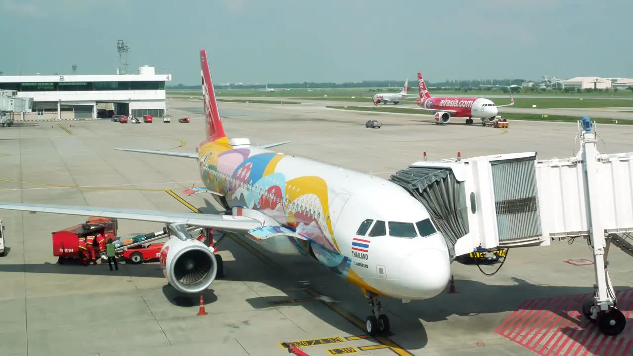 Landscape view in the Donmuang international airport in Bangkok Thailand with airplane parking the airport