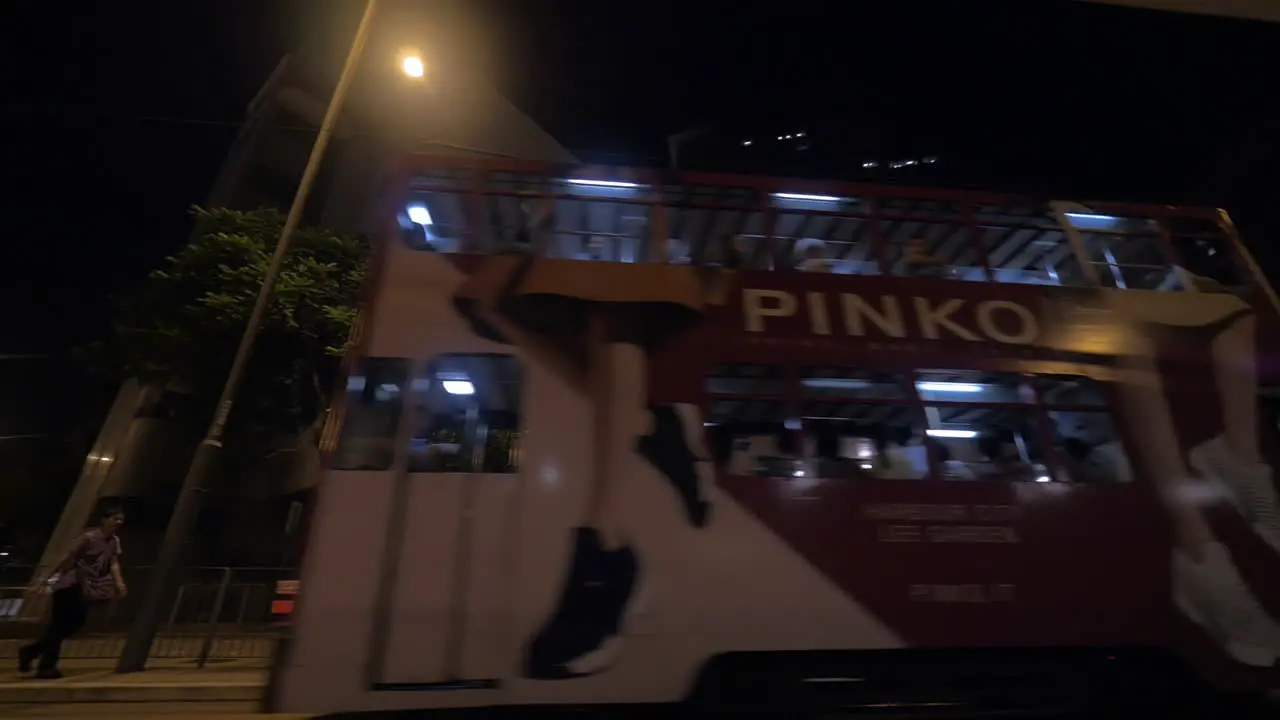 Double-deck trams in Hong Kong at night