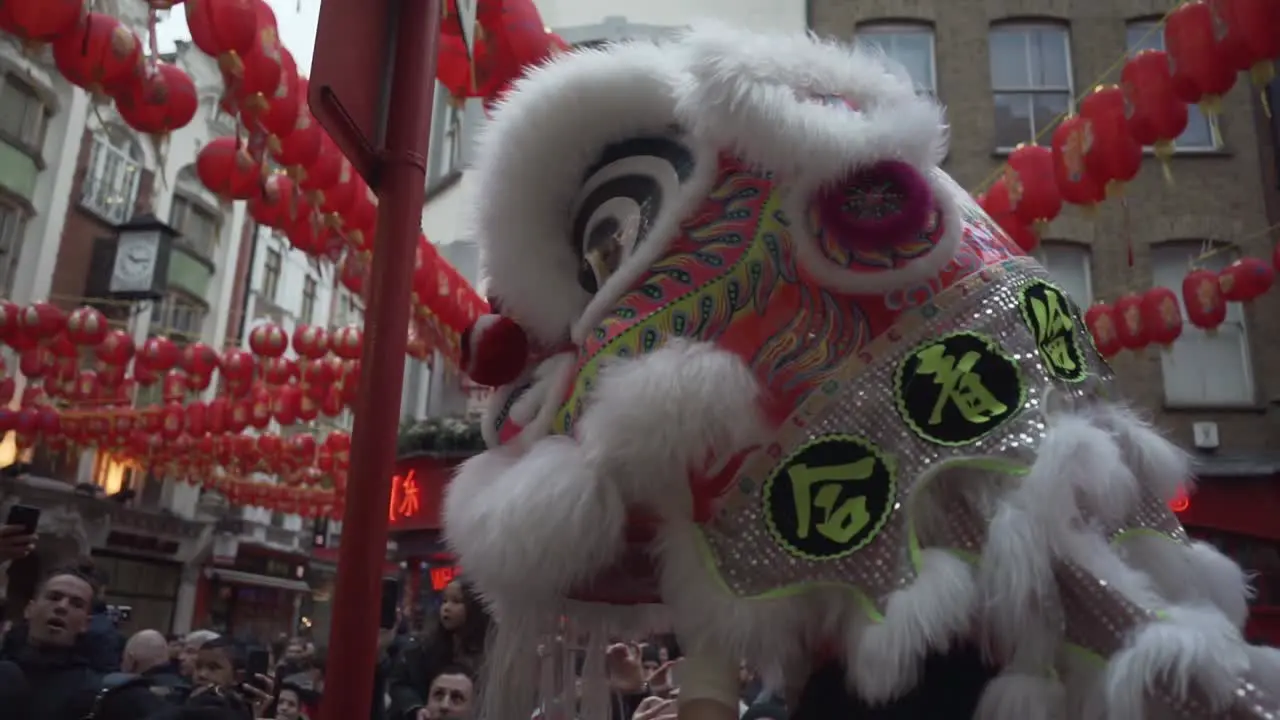 Dragon dancer in china town london england during new year celebration parade