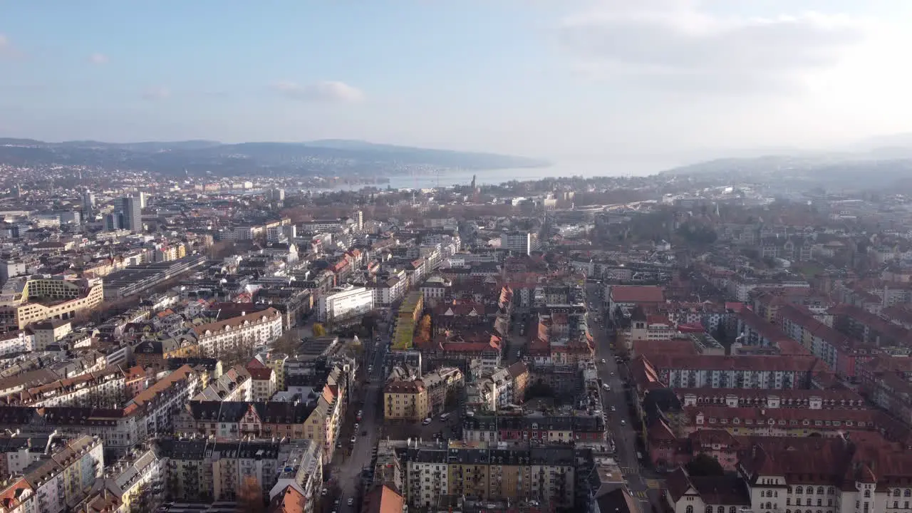 Aerial establishing shot over historic Zürich city in the heart of Switzerland