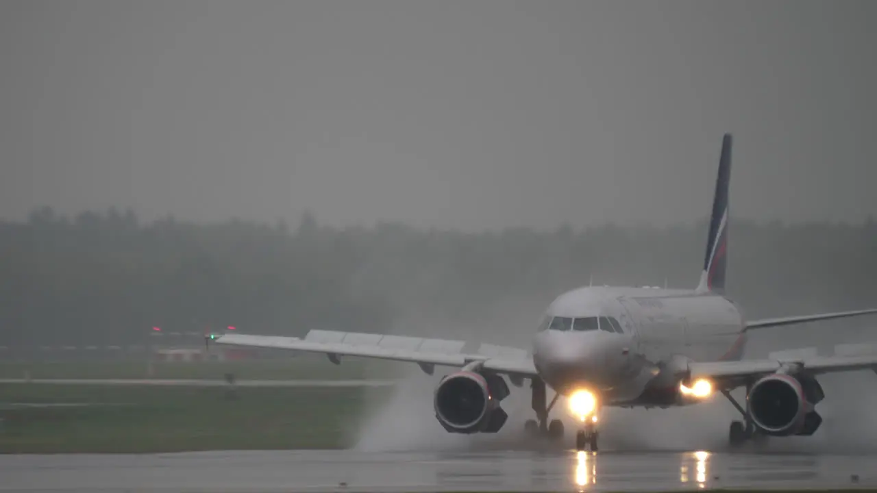 Aeroflot Airbus A320 landing on wet runway at Sheremetyevo Airport