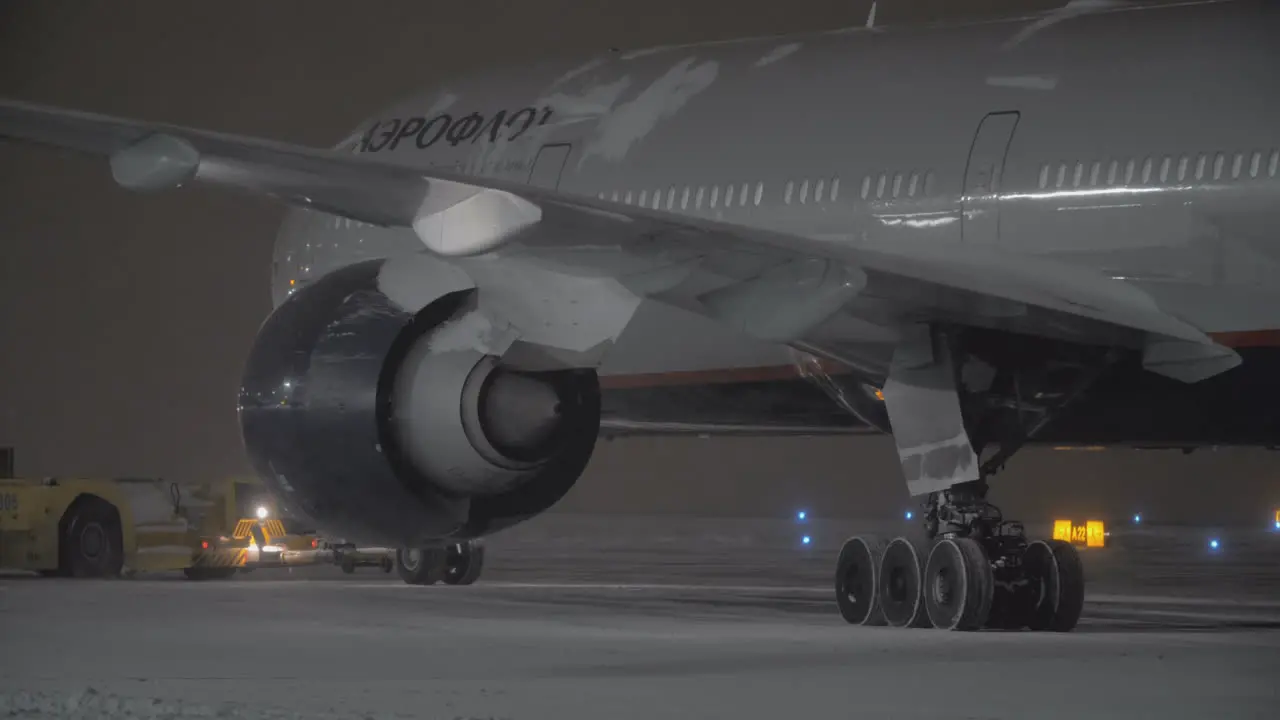 Towing Aeroflot aircraft at winter night Moscow