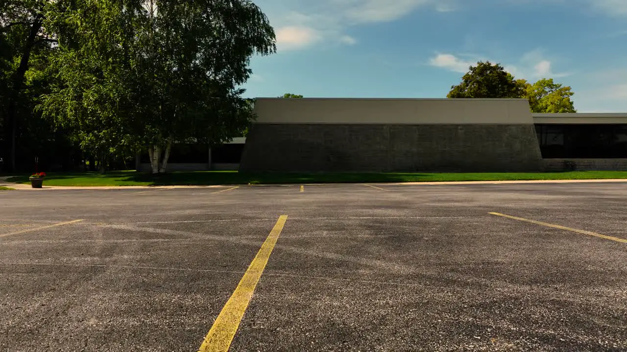 Drone lifting off from a parking lot near a local landmark