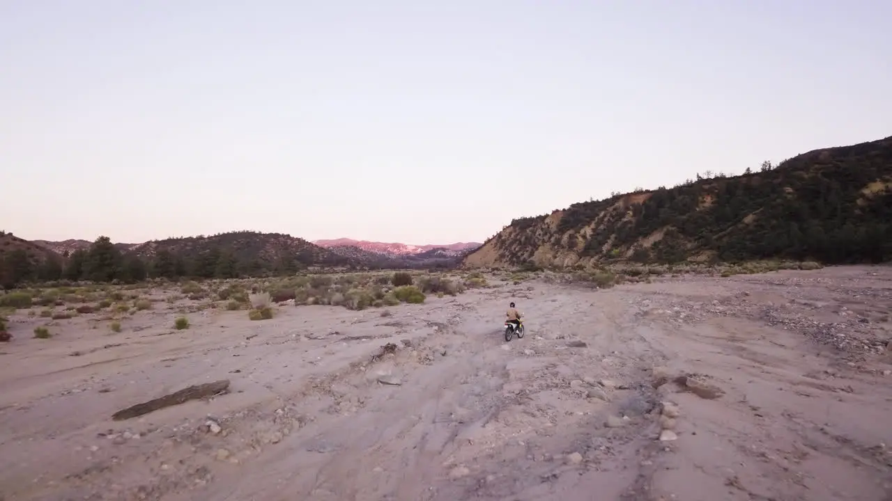 A Male is Riding on a Motorcycle in California