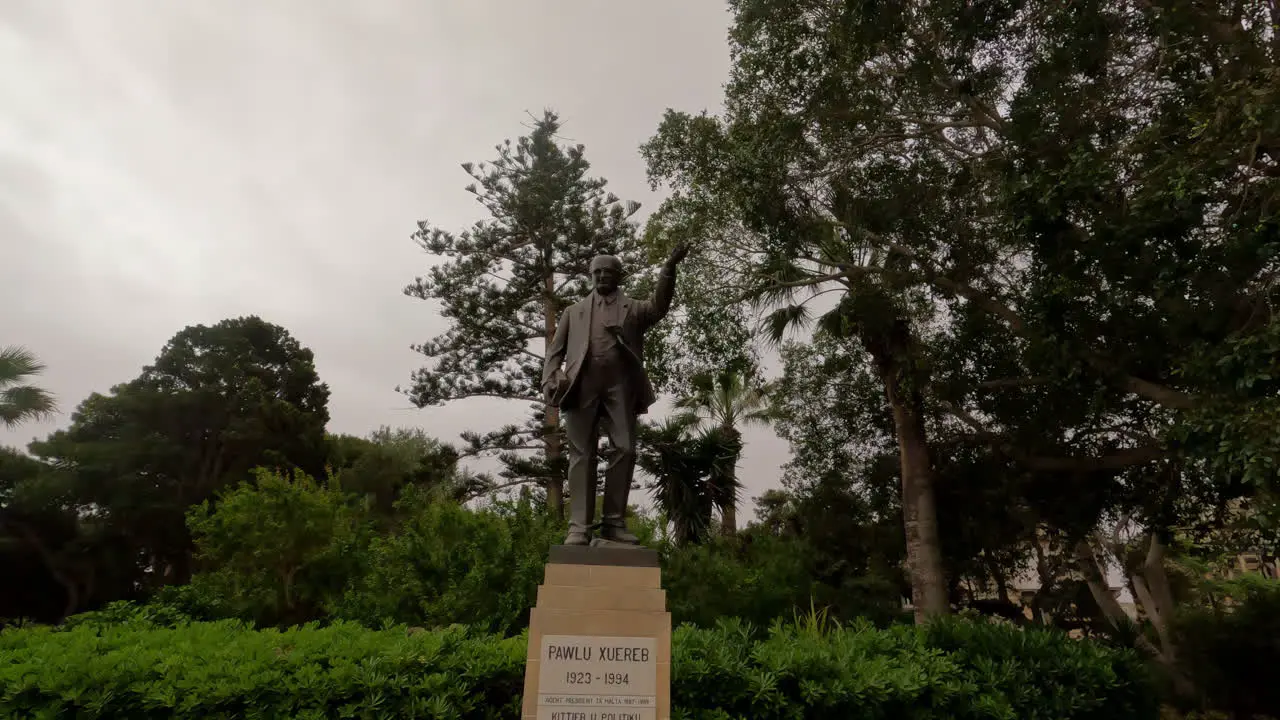 Statue of Pawlu Xuereb in Malta island dolly forward view