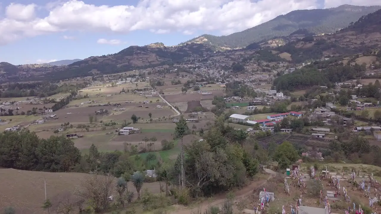 A drone flying towards the mountains in Michoacán Mexico