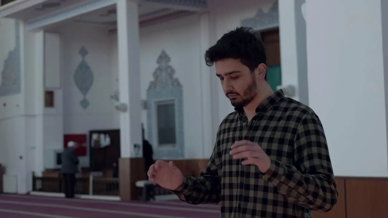 Young Man In Mosque Prays 6