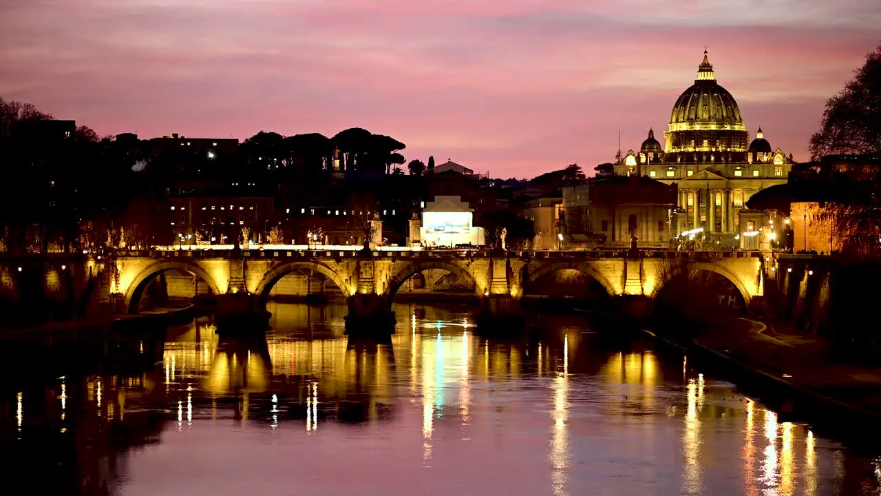 Beautiful pink sunset over Sant'Angelo bridge with St