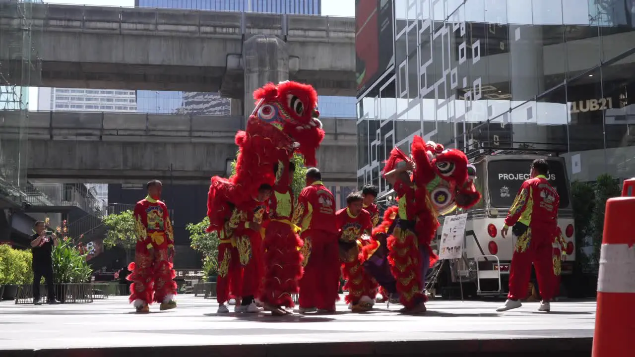 Lion Chinese dance climb in Bangkok Streets Thailand