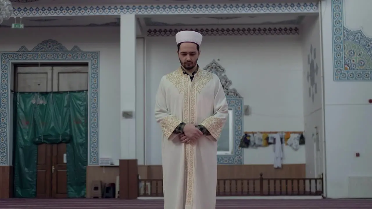 A Young Man Prays In The Mosque