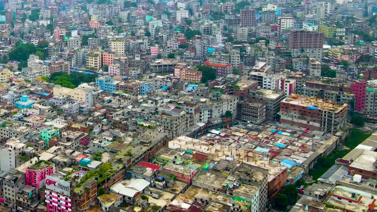 Drone Fly Over Dhaka Cityscape Along Buriganga Riverbanks In Bangladesh