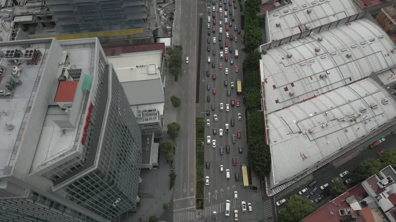 Mexico City aerial follows vehicle traffic on Av Jose Vasconcelos