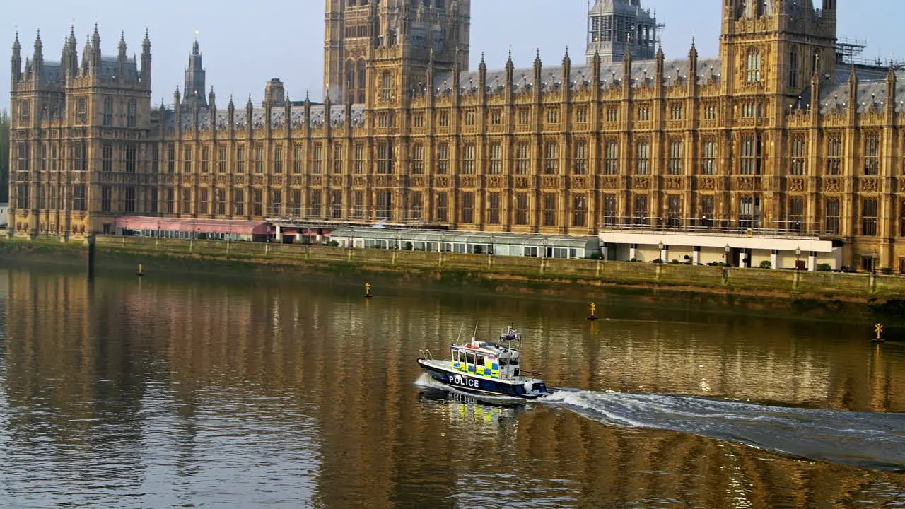 Police boat on the River Thames by the Houses of Parliament doing security for a protest event in Central London during Coronavirus Covid-19 lockdown in England UK