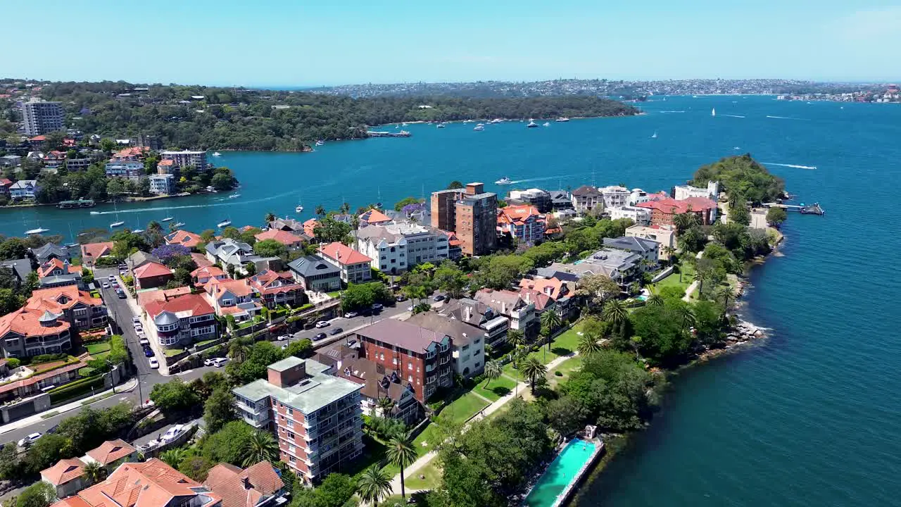 Drone aerial scenery view Mosman bay Bradleys Head Cremorne Point housing residential apartments sea inlet reserve Sydney Harbour travel tourism CBD NSW Australia