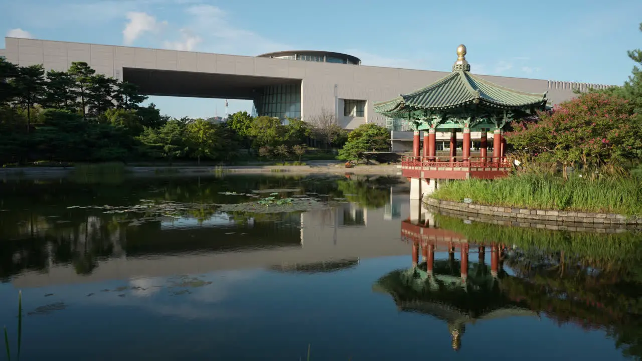 Empty Cheongjajeong Pavilion by Calm Pond at the National Museum of Korea in Summer static