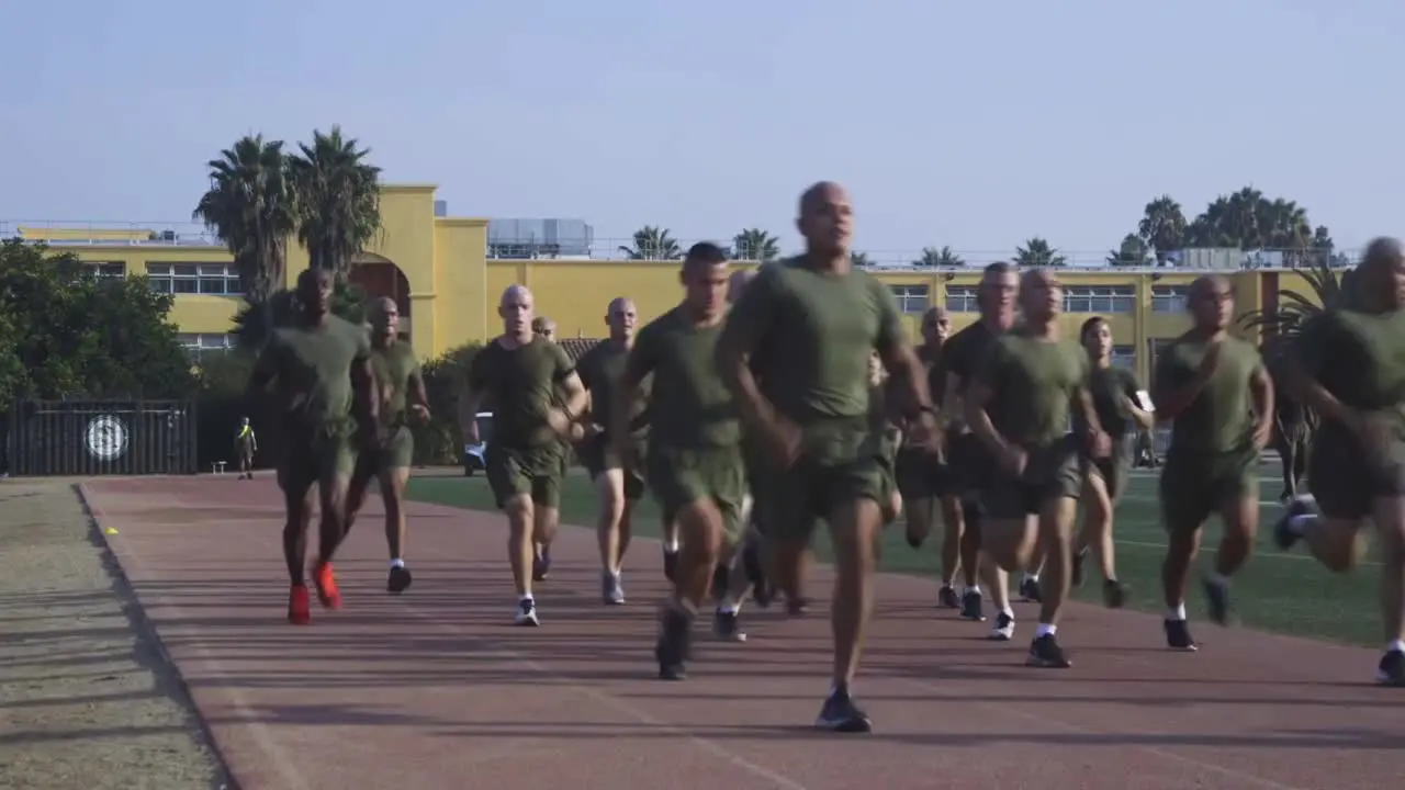 Us Marine Corps Drill Instructor School Soldiers Run Laps And Stretch During Physical Training Exercises California