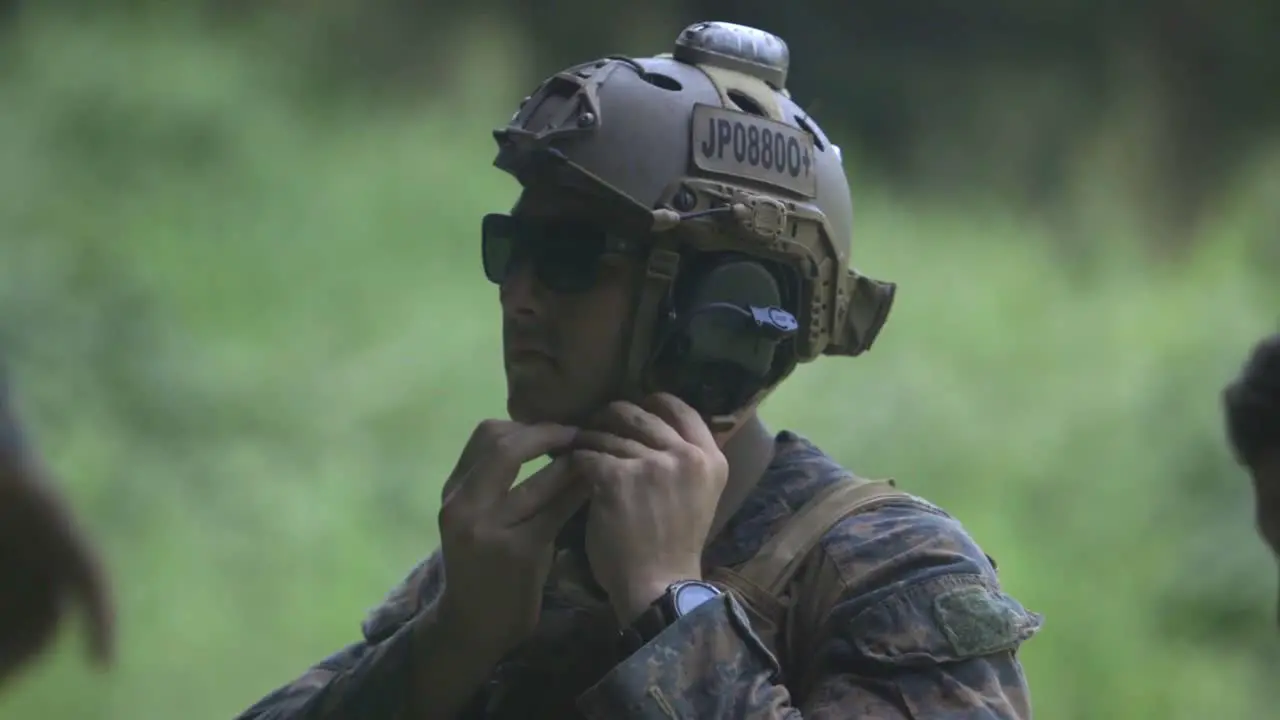 Camouflaged Us And Phillipine Marines Prepare To Practice Their Automatic Weapons Marksmanship Skills