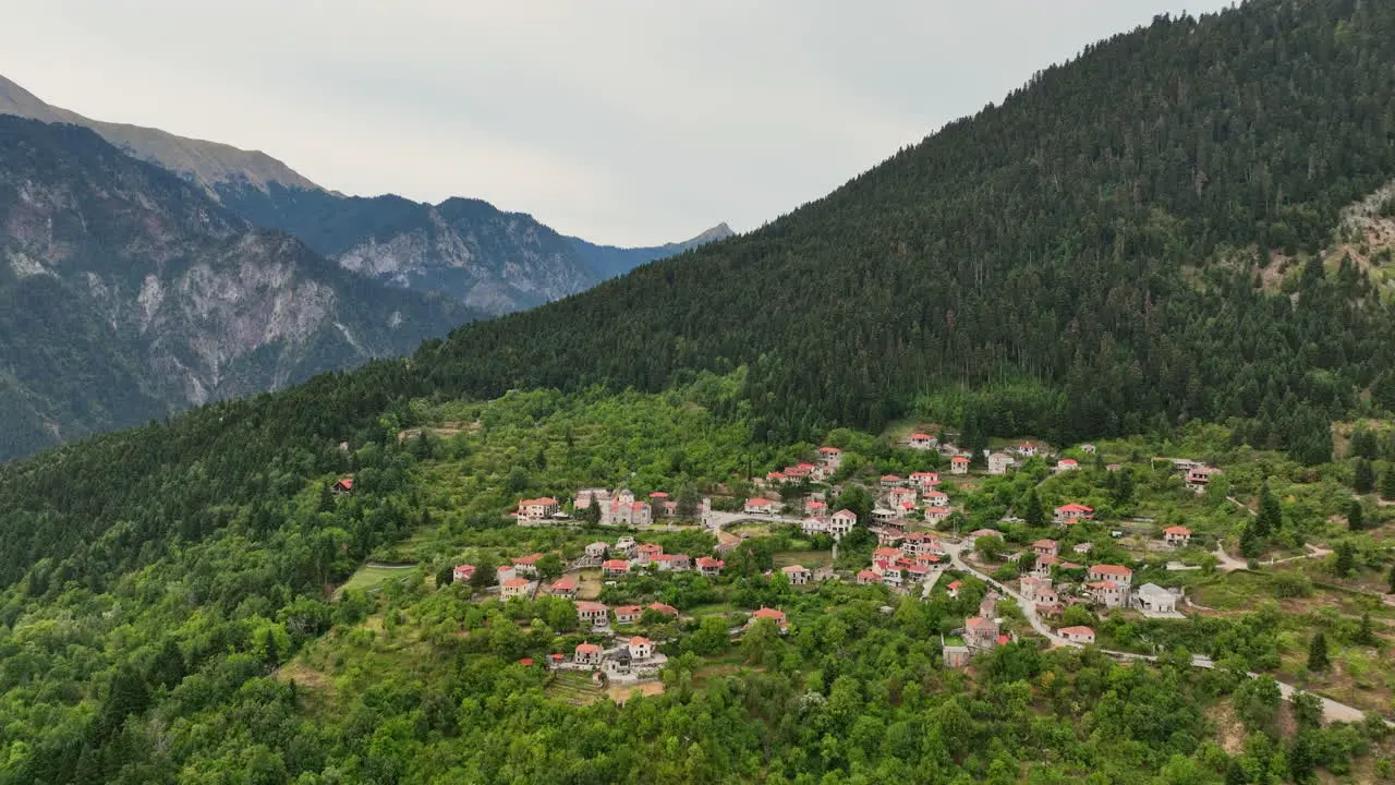 Aerial drone view of old stone houses in traditional village in Greece