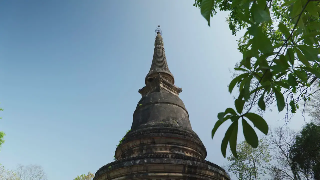 4K Cinematic religious travelling footage of the Buddhist Temple of Wat Umong in Chiang Mai Northern Thailand on a sunny day