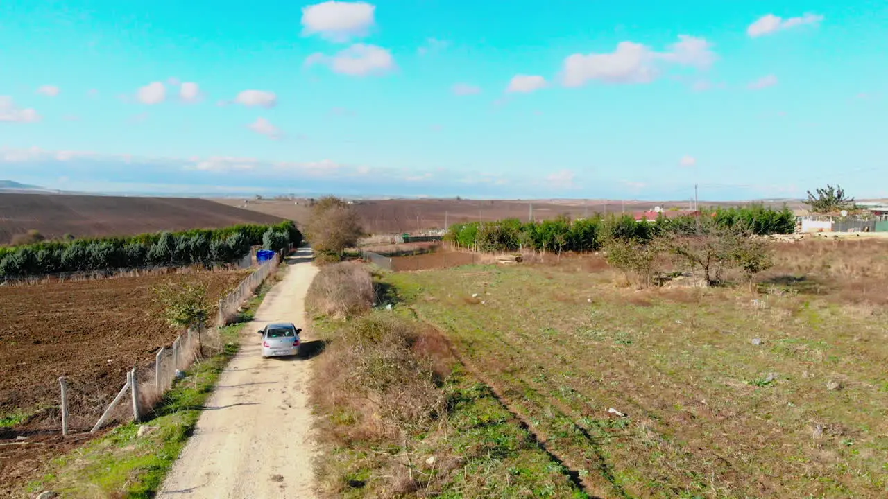 Drone Shot Of Farmland in Istanbul Turkey for car crossing the green field