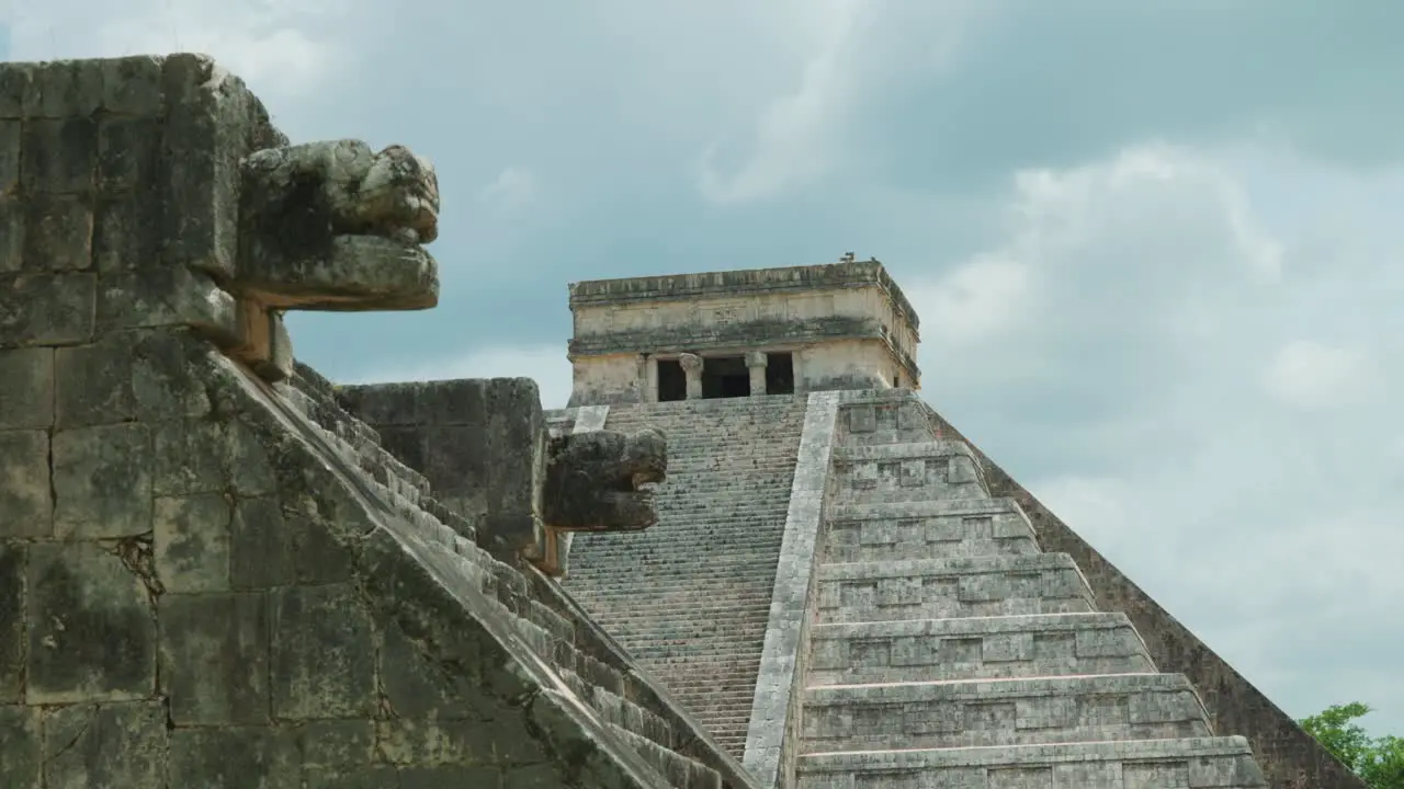 4K Cinematic landscape footage of the Mayan ruins monument of Chichén Itzá one of the seven wonders in Yucatan Mexico on a sunny day