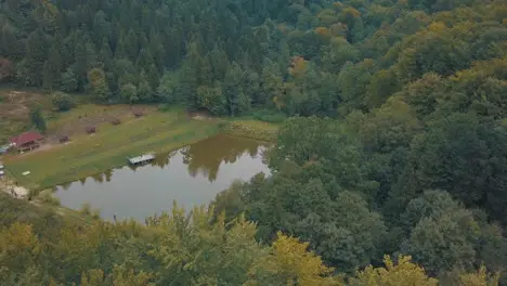 The Lake in the middle of a forest View from the top Autumn Aerial