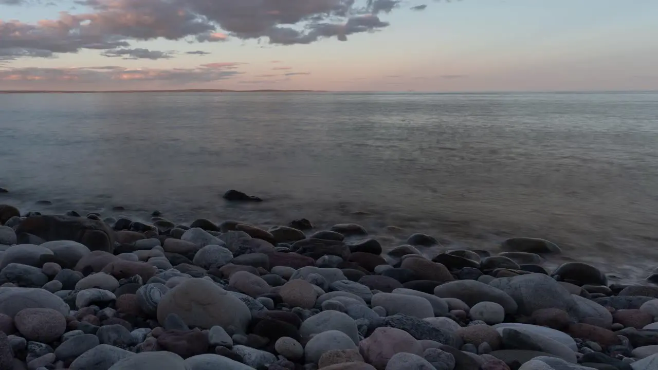 Beautiful rocky beach at sunset